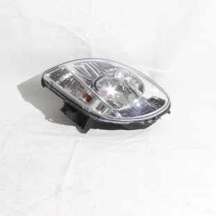 Farol Dianteiro Renault Kangoo 2000 a 2013 - Esquerdo / Dianteiro / Externo - Original